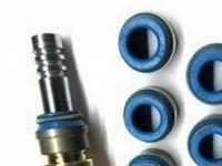 Ознаки зносу маслозйомних ковпачків